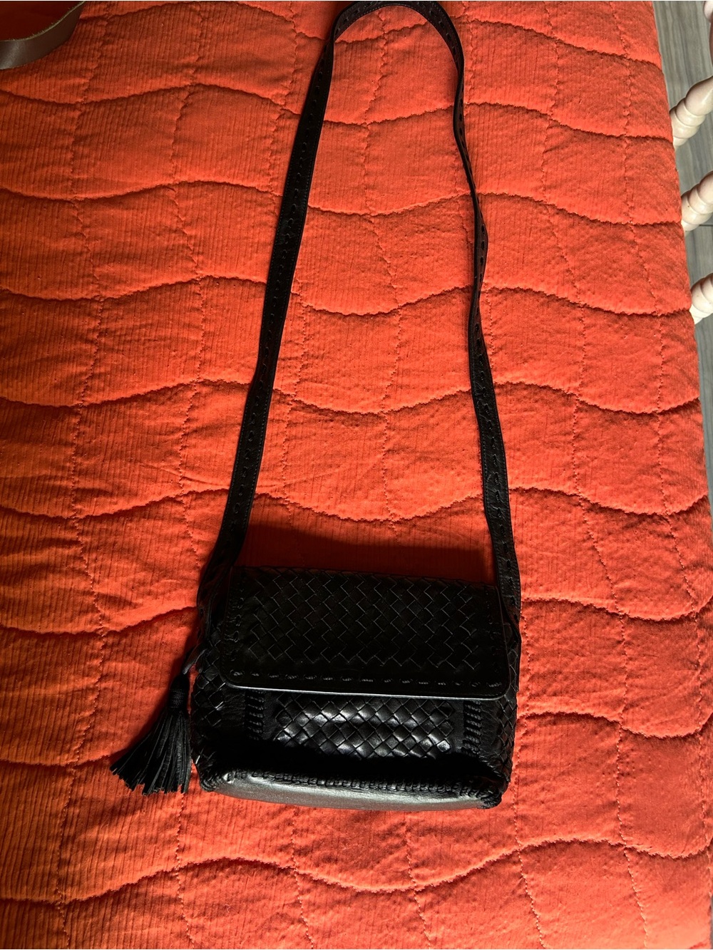 Woven Black Leather Crossbody with Tassel Accent